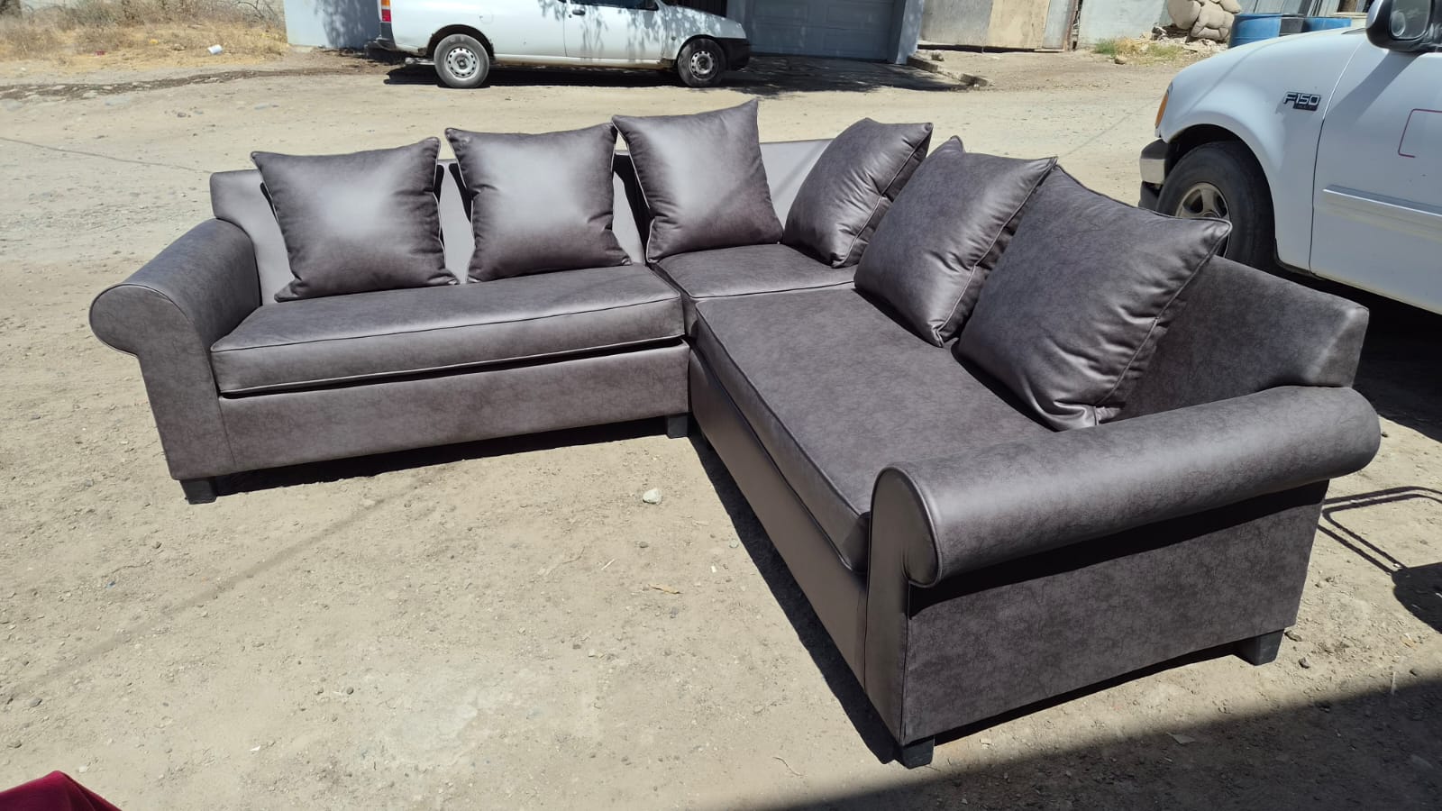 Sillón esquinero en piel sintética gris